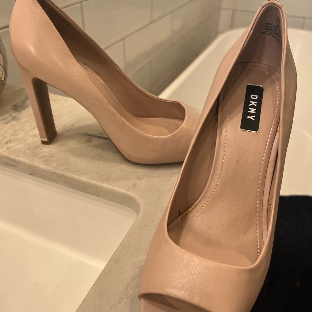 NWOT. Only tried on . Love them but Just a bit too big .